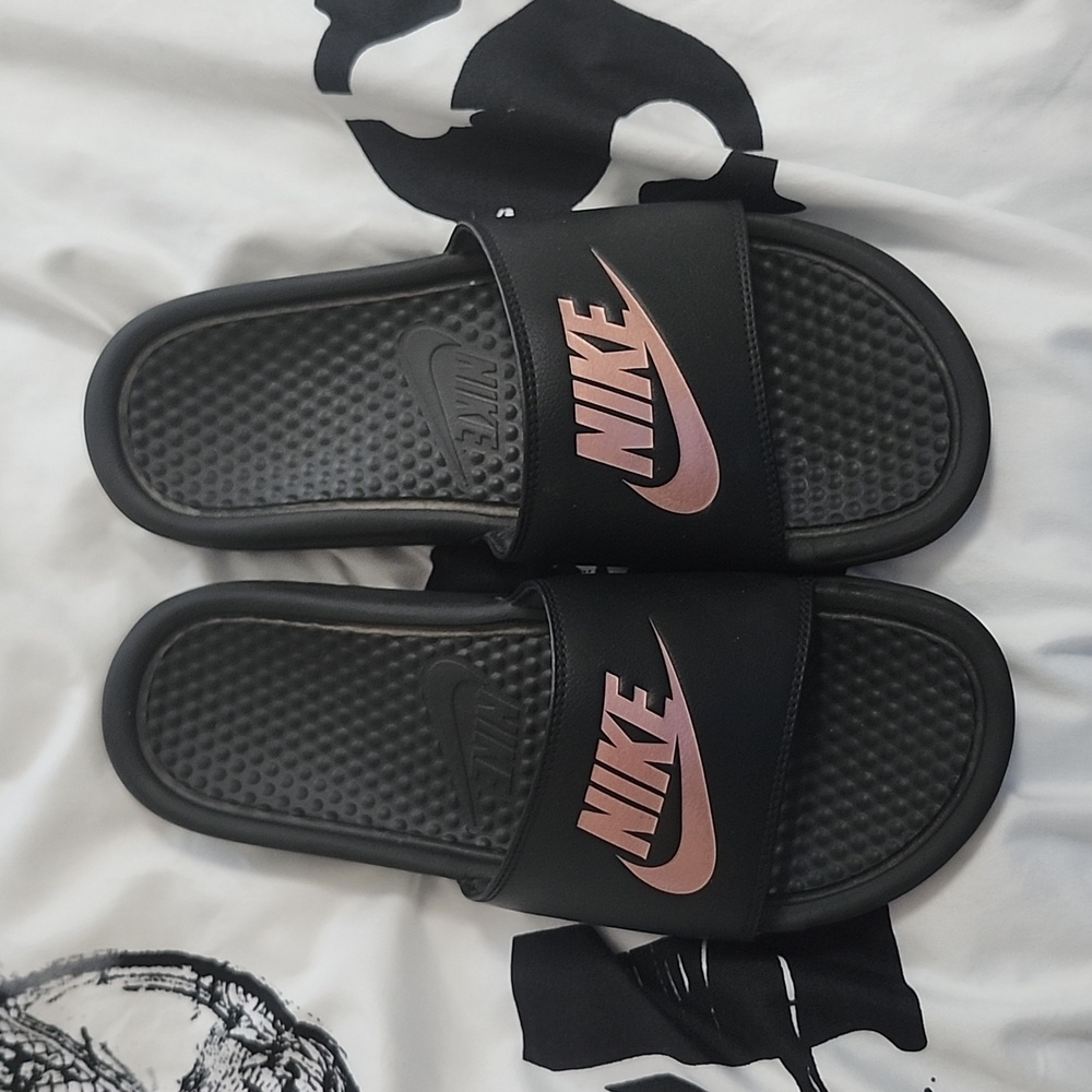 Nike black slides. Used but in really good shape.
